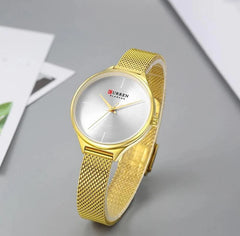 Curren white Dial & golden Stainless Steel Chain Analog Quartz Women's Watch.
